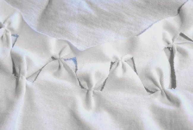 Decorating a white T-shirt with your own hands