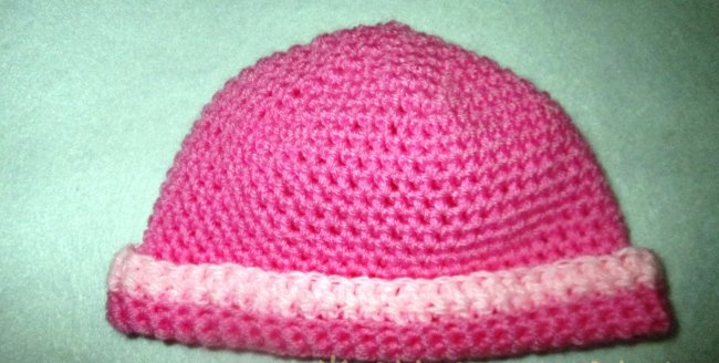 Crochet hat with a bow for a baby