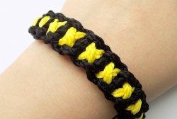 How to weave an “X” bracelet from cords