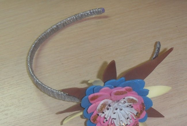 Decorating a headband for a girl