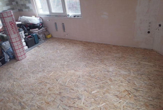 Laying infrared film flooring