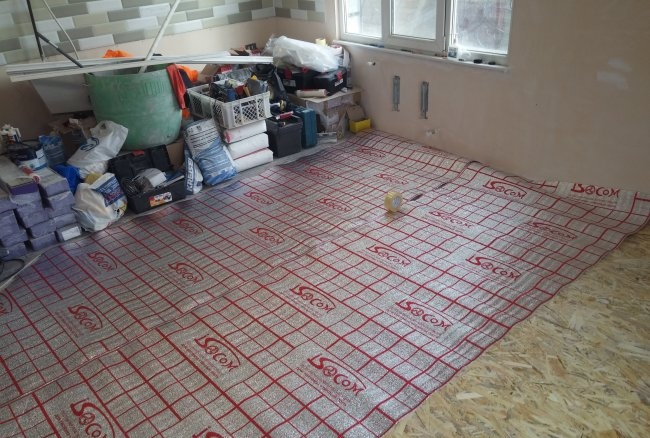 Laying infrared film flooring