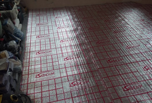 Laying infrared film flooring