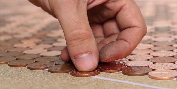 Coin floor under epoxy resin