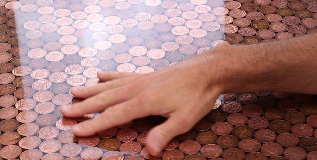 Coin floor under epoxy resin