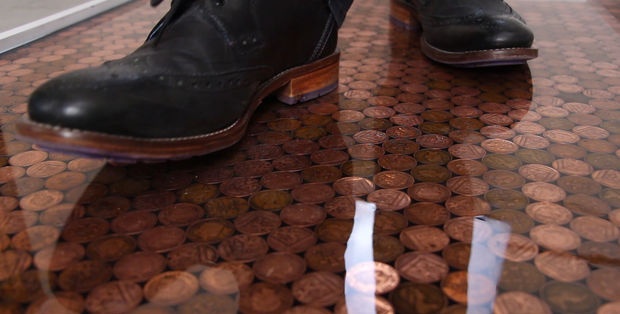 Coin floor under epoxy resin