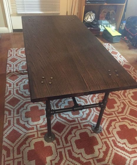 Retro style table with pipe base