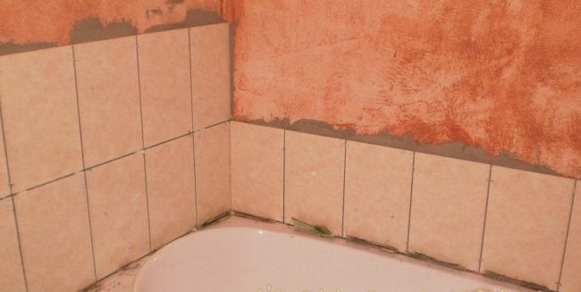 Laying tiles on walls and floors