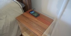 “Wireless” bedside table for charging gadgets