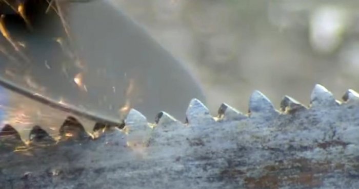 A quick way to sharpen a hand saw with a grinder