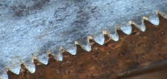 A quick way to sharpen a hand saw with a grinder