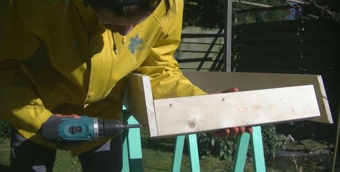 Folding wooden ladder