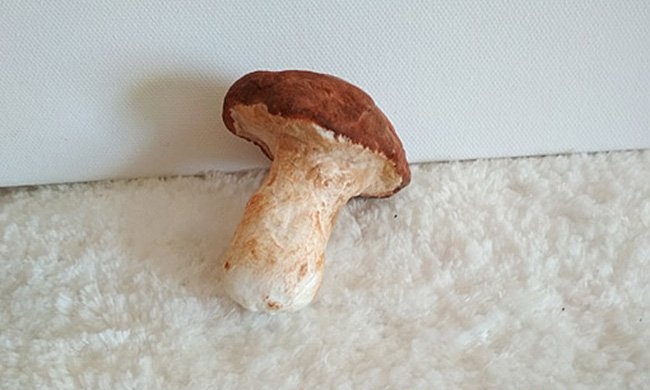 Mushroom on a Christmas tree made of cotton wool