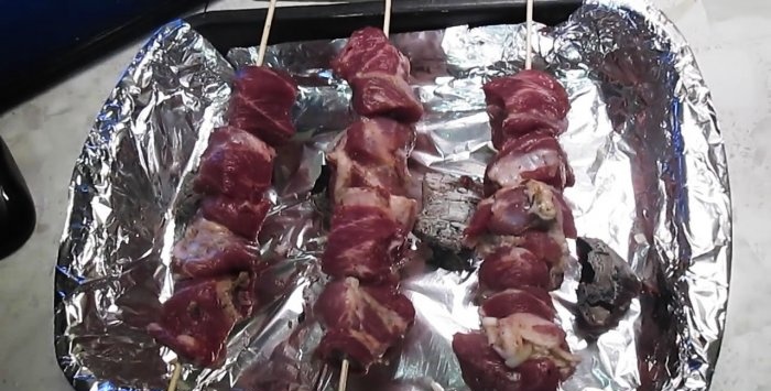 Shish kebab in the oven on coals