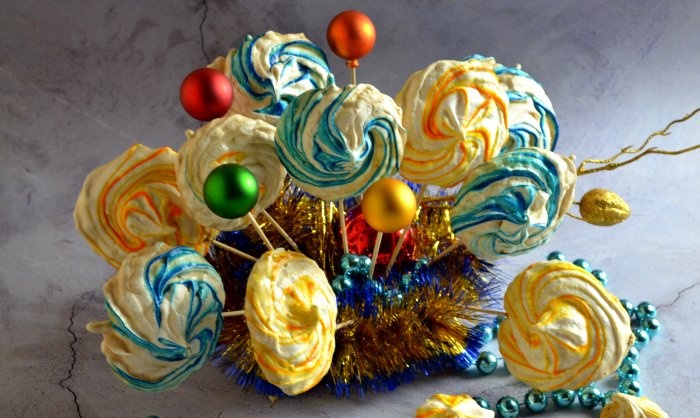 New Year's colorful meringues on skewers