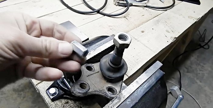 Movable bracket for attaching an angle grinder from a ball joint