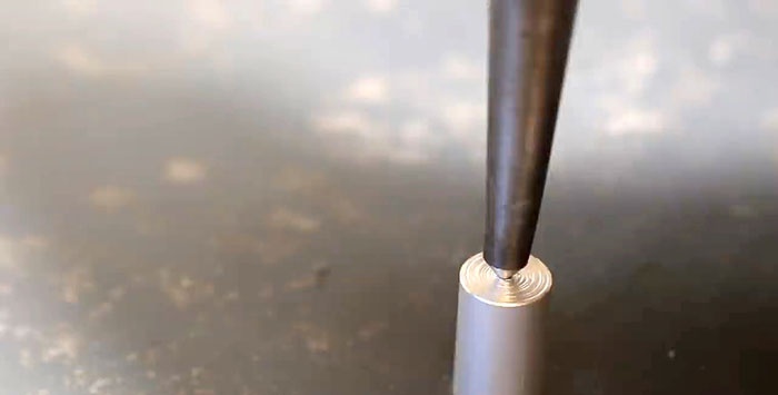 How to accurately drill a side hole in a round workpiece