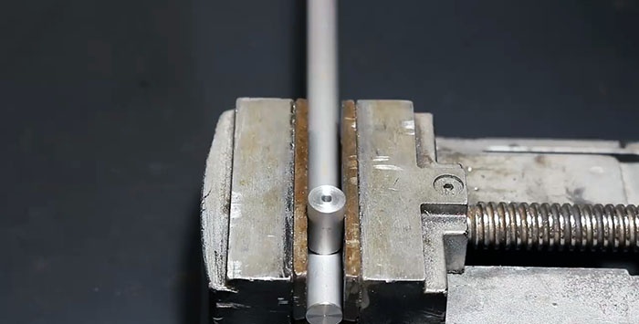 How to accurately drill a side hole in a round workpiece