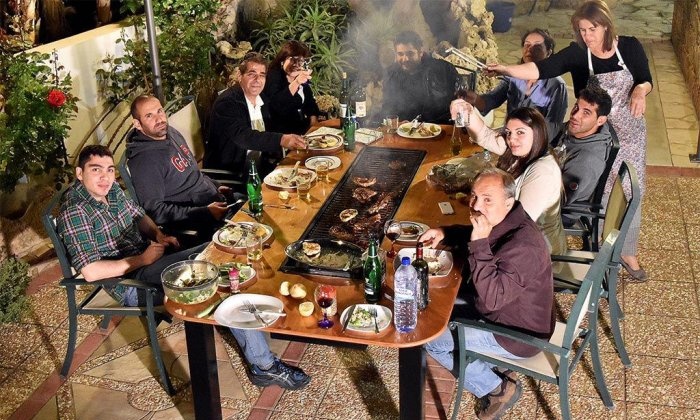 Homemade table with built-in barbecue