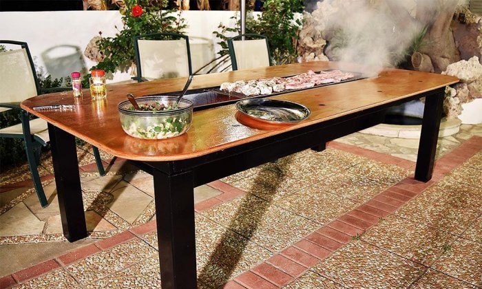 Homemade table with built-in barbecue