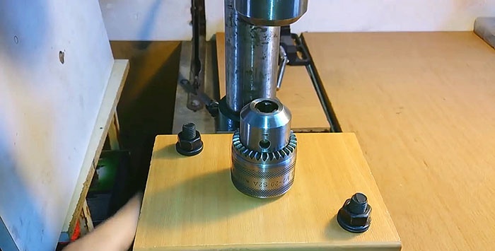 Drilling machine centering attachment for precision drilling