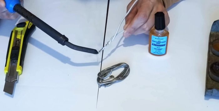 Soldering strands of aluminum and copper wire