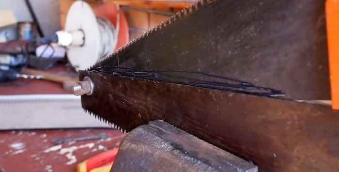 Metal cutter made from old wood hacksaws