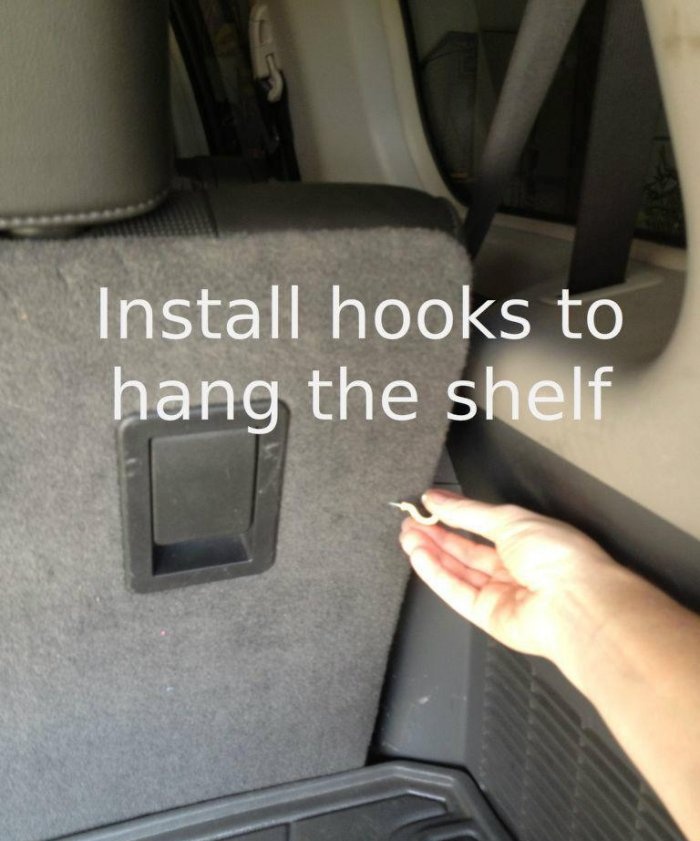 Convenient folding shelf in the trunk of a car