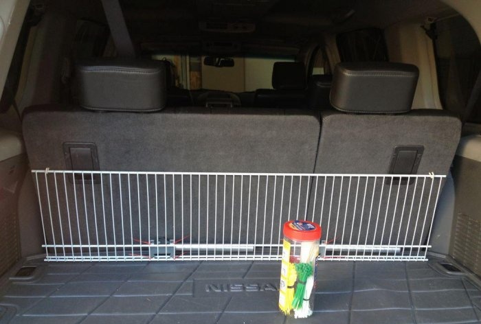 Convenient folding shelf in the trunk of a car