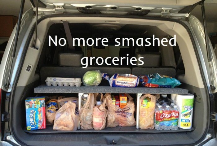 Convenient folding shelf in the trunk of a car