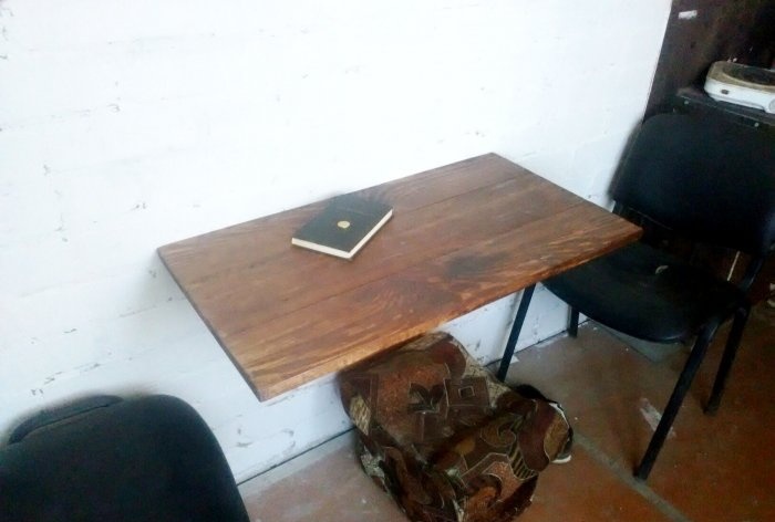 Wooden table with wall mount