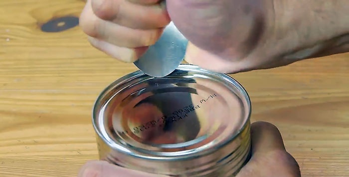 How to open a tin can with a spoon