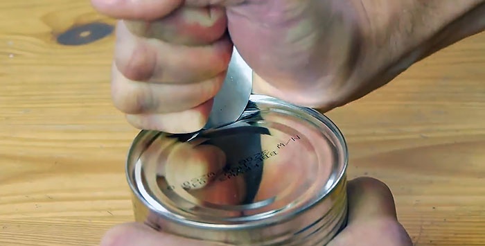 How to open a tin can with a spoon