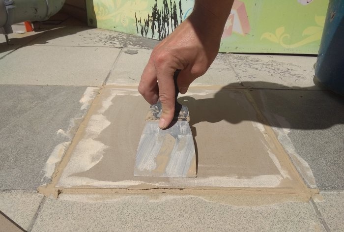 Removing old tiles and laying new tiles on threshold steps