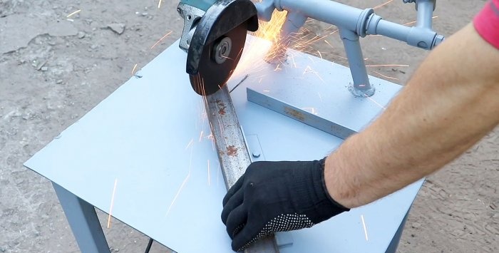 A simple stand for an angle grinder made from a bicycle