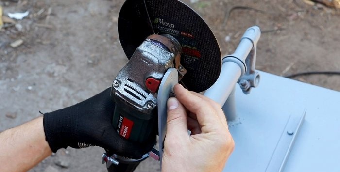 A simple stand for an angle grinder made from a bicycle