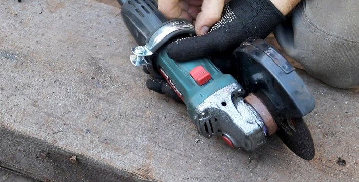 A simple stand for an angle grinder made from a bicycle