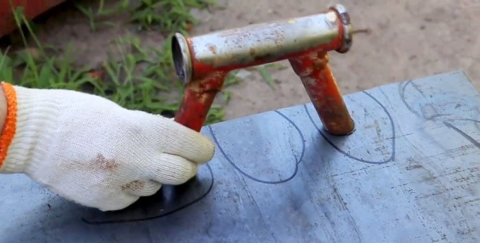 A simple stand for an angle grinder made from a bicycle