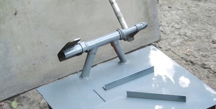 A simple stand for an angle grinder made from a bicycle