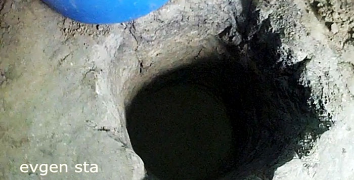 How to make a mini-cellar from a barrel in a garage at the dacha