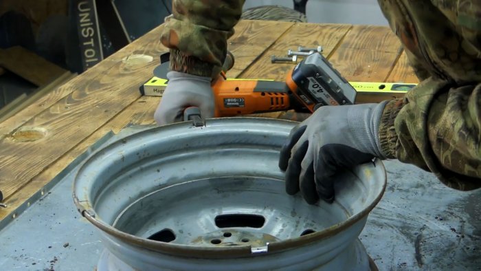 DIY garden hose reel from a car wheel