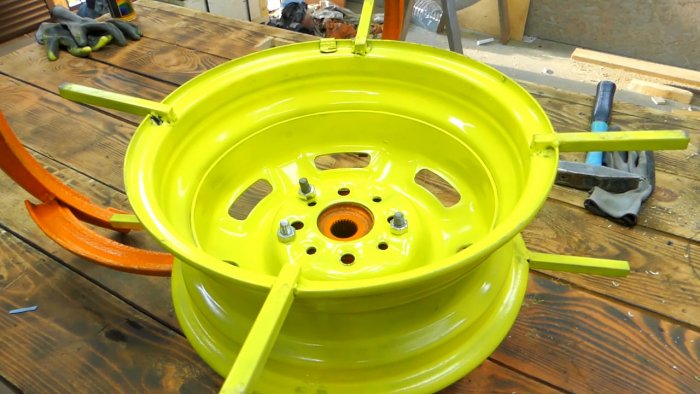 DIY garden hose reel from a car wheel