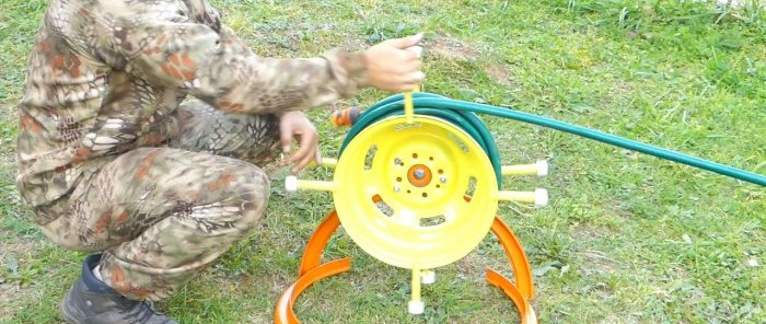 DIY garden hose reel from a car wheel