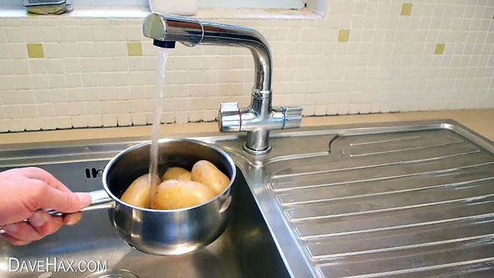 A way to quickly peel potatoes so that the skin peels off on its own