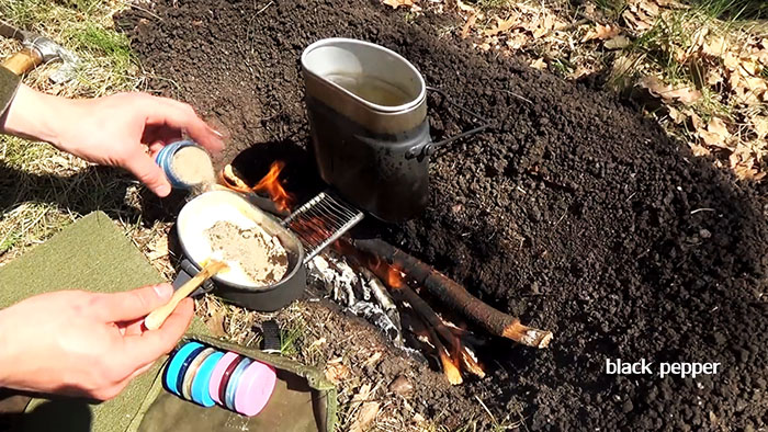 Picnic in nature delicious pasta on the fire