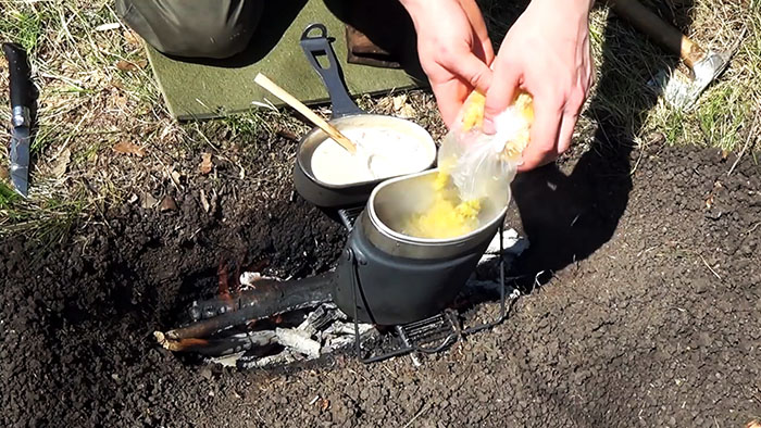 Picnic in nature delicious pasta on the fire