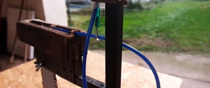 How to make a machine for sawing firewood from an electric chain saw