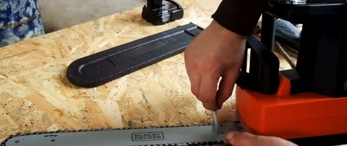 How to make a machine for sawing firewood from an electric chain saw