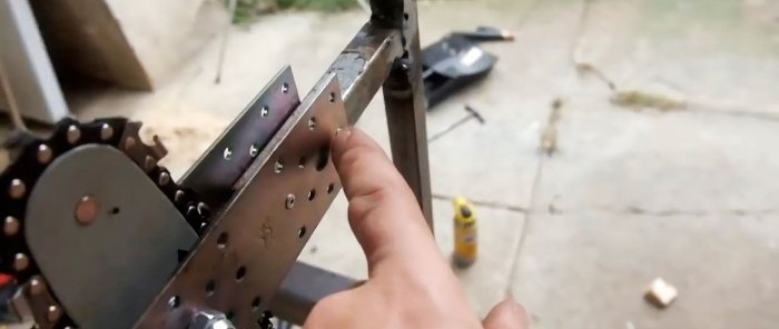 How to make a machine for sawing firewood from an electric chain saw