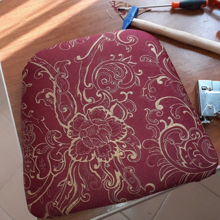 Replaced the upholstery of an old chair and got original furniture